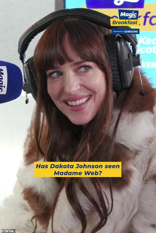 Dakota Johnson got candid watching her latest film, Madame Webb, after critics panned it;  Pictured from the MagicFM interview on February 15.