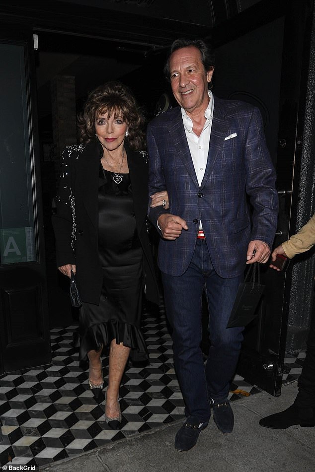 Dame Joan Collins enjoyed a romantic date night with her husband Percy Gibson at Craig's restaurant in West Hollywood on Tuesday.