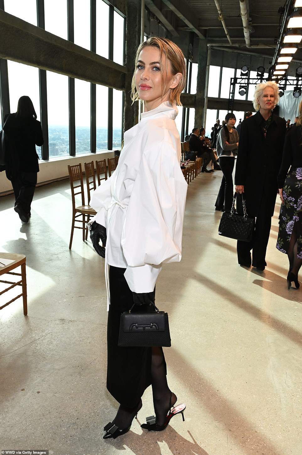 Julianne wore the loose white top, tied over one hip, with a simple long black skirt, gloves, stockings and heels.