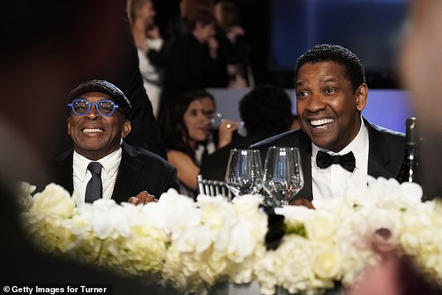 Spike Lee, 66, and Denzel Washington, 69, will work together again, for the first time since 2006, in the remake of Akira Kurosawa's 1963 film High and Low. The Oscar-winning filmmaker and actor were photographed at an event in Los Angeles in 2019.