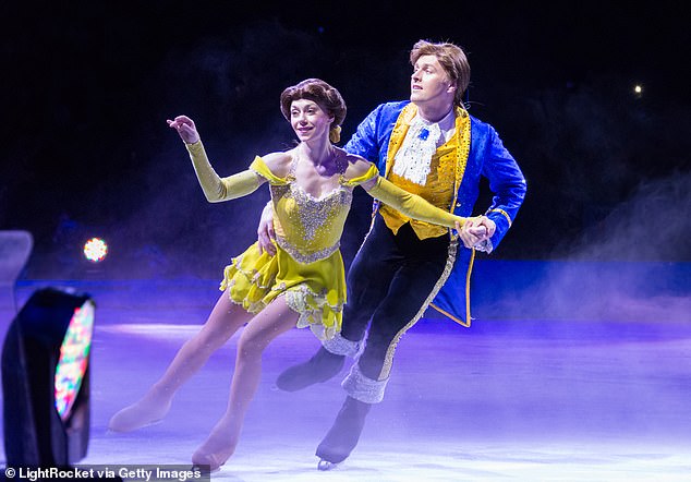 The skater who played Belle on Saturday's Disney on Ice: Magic in the Stars fell while being lifted into the air by another cast member during the performance at the Target Center in Minneapolis, Minnesota.  Pictured: Disney ice skaters performing Beauty and the Beast during a performance in Toronto, Canada, in 2016.