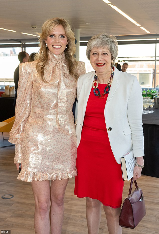 Fashion statements: Cleo Watson and Theresa May at the Whips party