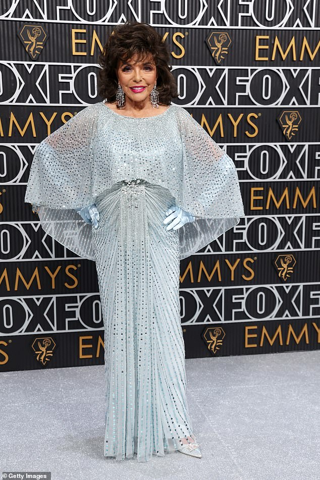 Joan Collins chose an ice blue dress by British designer Jenny Packham for January's Emmy Awards in Los Angeles.