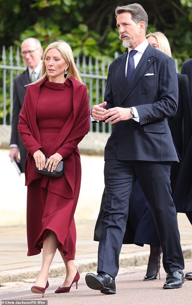 Pictured: Crown Prince Pavlos and his wife, Crown Princess Marie Chantal, looked somber as they arrived at the service.