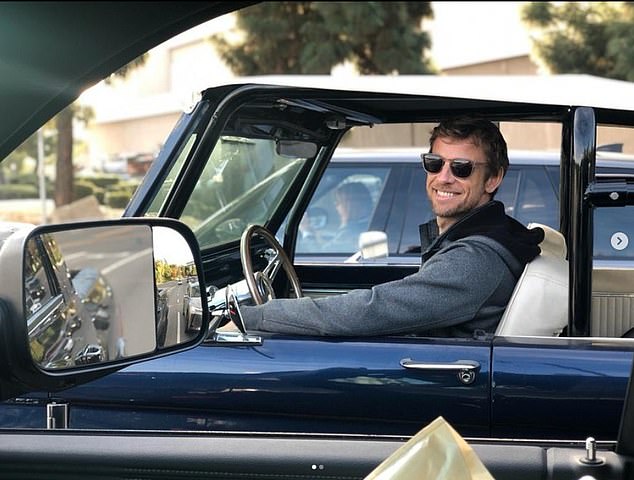 Jenson Button posted this photo on Instagram of him behind the wheel of the Ford Bronco with the caption: 'Navigating Brittny Ward's Bronco, basically keep the battery charged for her!'