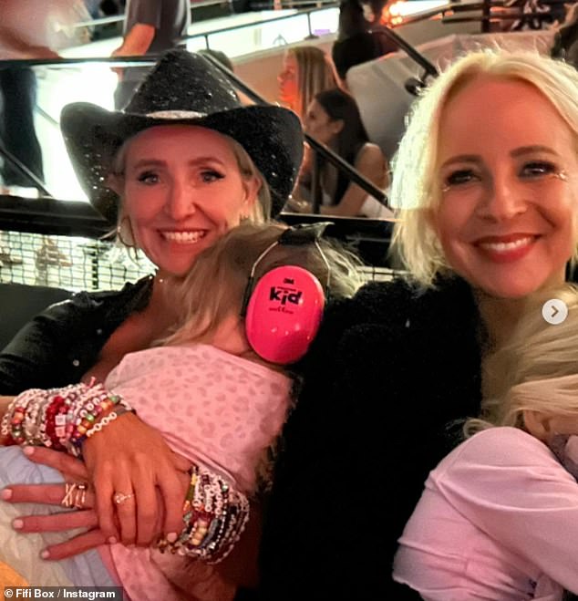 Fifi Box has shared a glowing review of Taylor Swift's concert at the Melbourne Cricket Ground on Friday.  Pictured: Fifi with her daughter Daisy, four, her best friend Carrie Bickmore and Carrie's daughter Adelaide, five.
