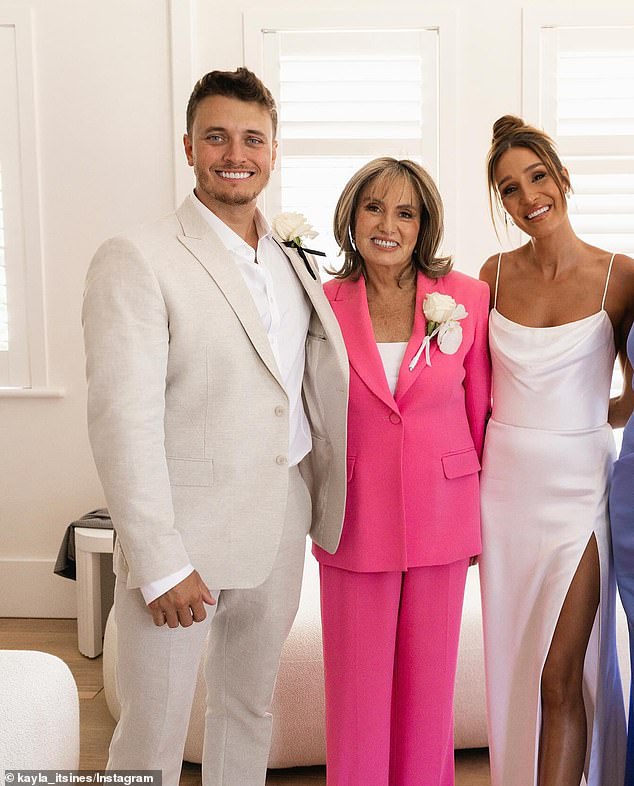 Kayla Itsines and her husband Jae Woodroffe took to social media on Monday to announce heartbreaking news, revealing that Jae's mother, Jenny, has died.  Everything in the photo