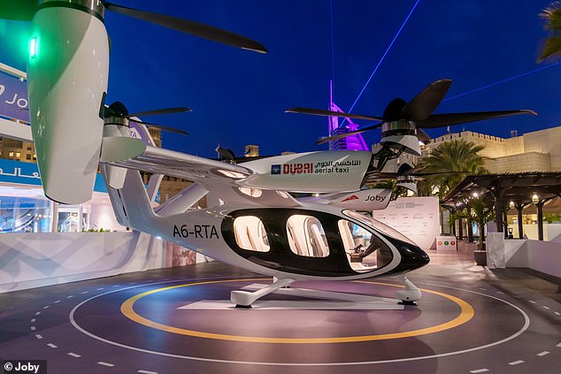 VTOL aircraft can take off directly into the air instead of having to first gain speed on the ground, reducing the need for runway space. Here, Joby's electric air taxi is on display at the World Government Summit in Dubai