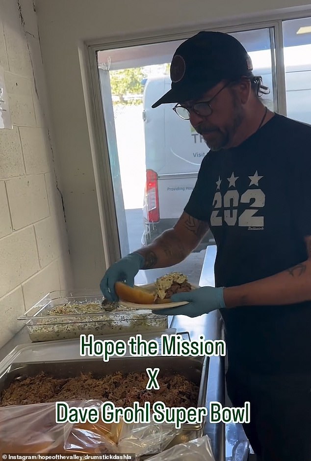 Foo Fighters frontman Dave Grohl set a personal record by helping feed about 1,800 people for 28 hours cooking at a barbecue for the homeless in Los Angeles on Super Bowl Sunday.