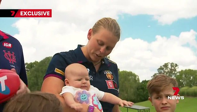 Brisbane Lions star Kate Lutkins has opened up about juggling motherhood and the tough demands of being an athlete.