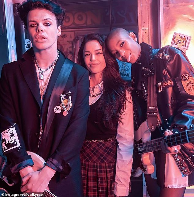 Valkyrae (center) with Willow Smith (right) and YUNGBLUD (left) on the set of their music video for Memories
