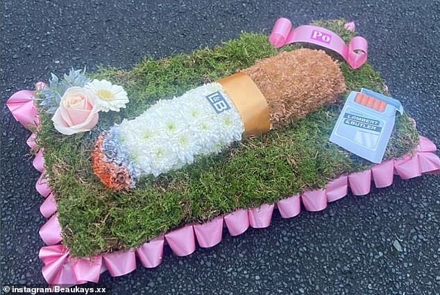 The cigarette-themed funeral floral display was displayed by a Liverpool flower firm.