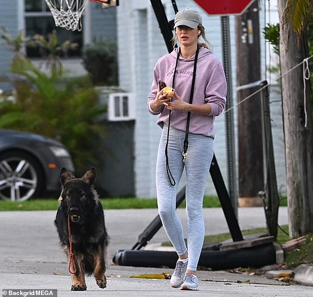 Gisele Bundchen appeared relaxed while walking her dog in South Florida after a source revealed she was 