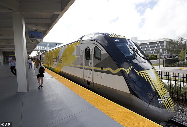 A proposed high-speed passenger train connecting Las Vegas to Los Angeles has received another boost with the approval of $2.5bn (£1.975bn) in additional funding.  The Brightline West Railway aims to take passengers across the Nevada desert in just two hours.  Pictured is a Brightline train in Fort Lauderdale.
