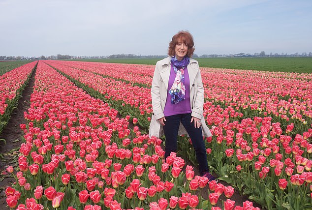 Bel (pictured) travels to Beemster, a UNESCO world heritage site, where she tiptoes through fields of tulips.