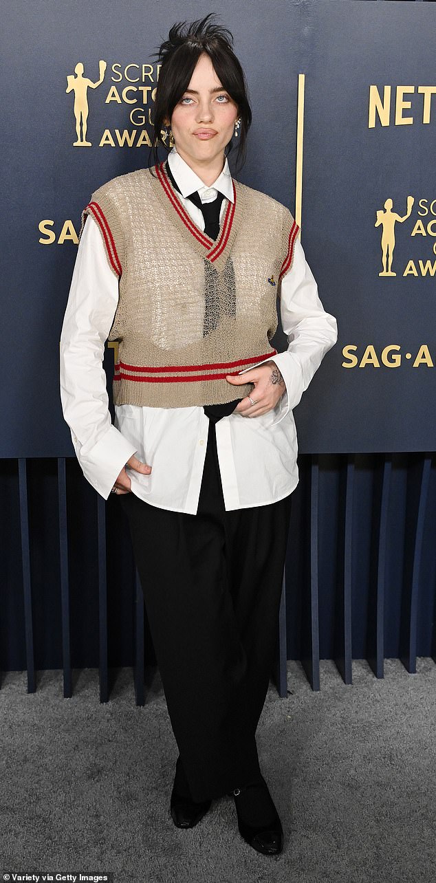 Billie Eilish, pictured, has been leading the tie's revival by wearing it to the SAG Awards on Saturday.
