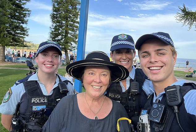 Journalist, comedian and gay rights advocate Julie McCrossin AM (center) has called on Mardi Gras organizers to reinstate the invitation for uniformed police to participate.