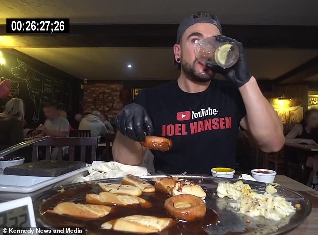 At 26 minutes, the competitive eater paused for a drink to help accompany the enormous meal, with bread and Yorkshire pudding still to be eaten.