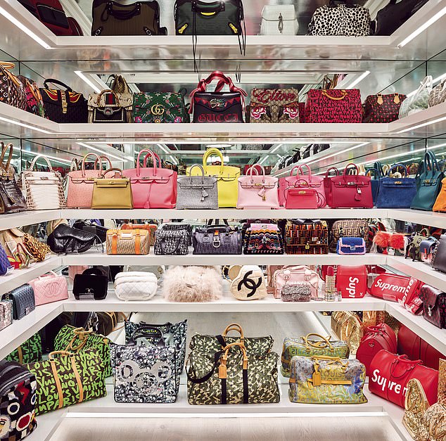 The rarest bag in the world, an Hermès Himalaya Kelly, is on the fourth shelf (second from the left)