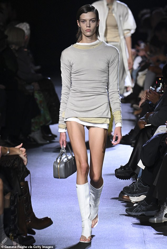 A model walks the runway during the Miu Miu Ready to Wear Spring/Summer 2023 fashion show as part of Paris Fashion Week.