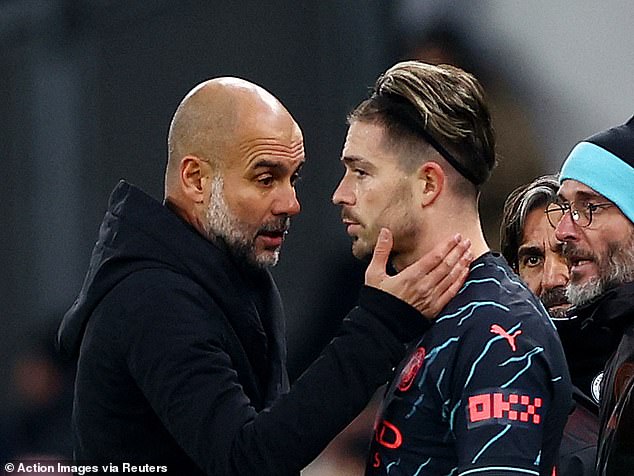 Jack Grealish looks distraught after the Man City star is