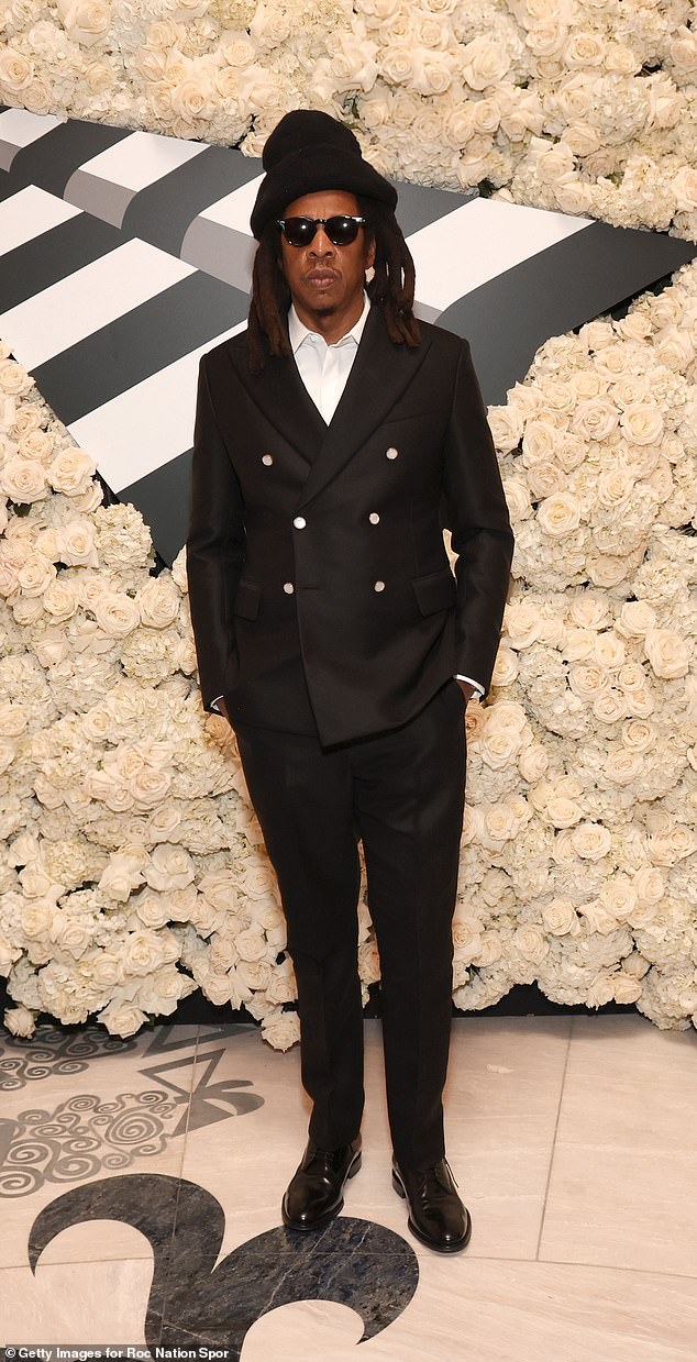 Roc Nation founder Jay-Z looked dapper in a black suit while attending the Roc Nation Sports Super Bowl Party at the Poodle Room at Fontainebleau in Las Vegas on Saturday.