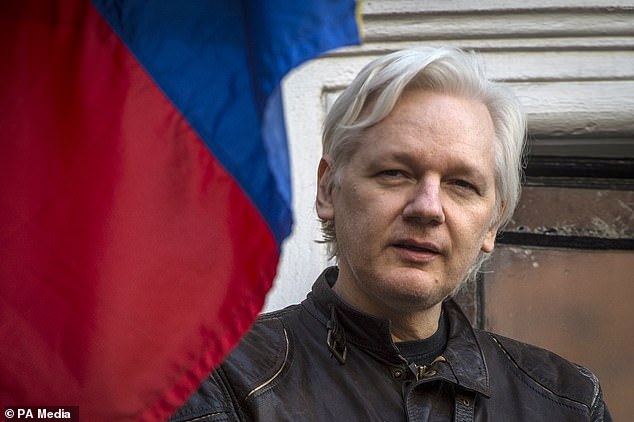 Julian Assange speaks from the balcony of the Ecuadorian embassy in 2017