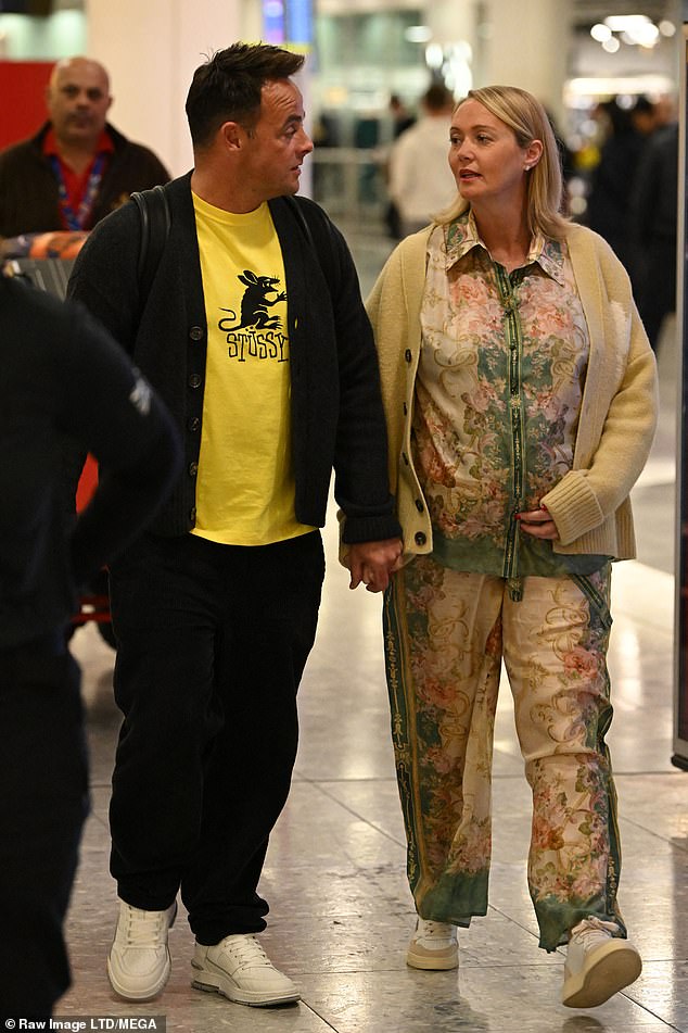 Baby Bump: Ant with Anne Marie at Heathrow Airport last month - The image that broke Lisa's heart
