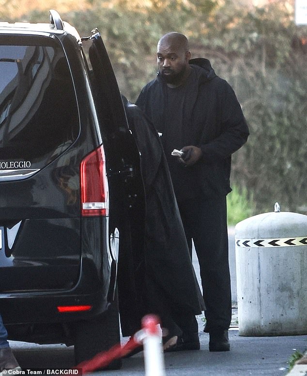 Apple Music quickly pulled Kanye West's Vultures 1 album just five days after it debuted on the platform on Thursday;  Kanye photographed in Italy on Wednesday
