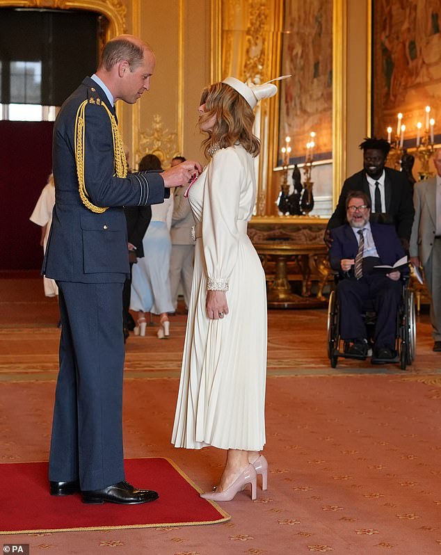 In June 2023, Kate Garraway was appointed a Member of the Order of the British Empire by the Prince of Wales at Windsor Castle.