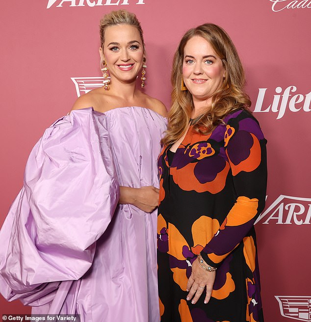 Katy Perry spoke about her upbringing as the daughter of devout Pentecostal parents who often had to rely on food stamps and food banks to survive, pictured in 2021 with her sister Angela Hudson Lerche.