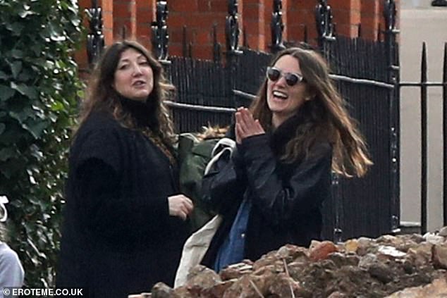 Keira Knightley looked in high spirits on Saturday as she enjoyed a meet-up with a friend in Hampstead.
