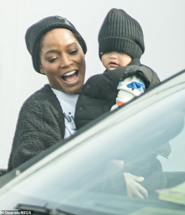 The 30-year-old actress was seen with a big smile on her face as she hugged the baby.