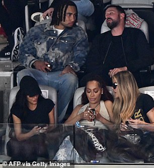 Kim lost the VIP box game to Taylor Swift during the Super Bowl in Las Vegas on Sunday. Her $1 million Super Bowl LVIII box seemed to be a snoozefest, while her enemy Taylor seemed to be having a great time. Kim looked at her cell phone with her head down.