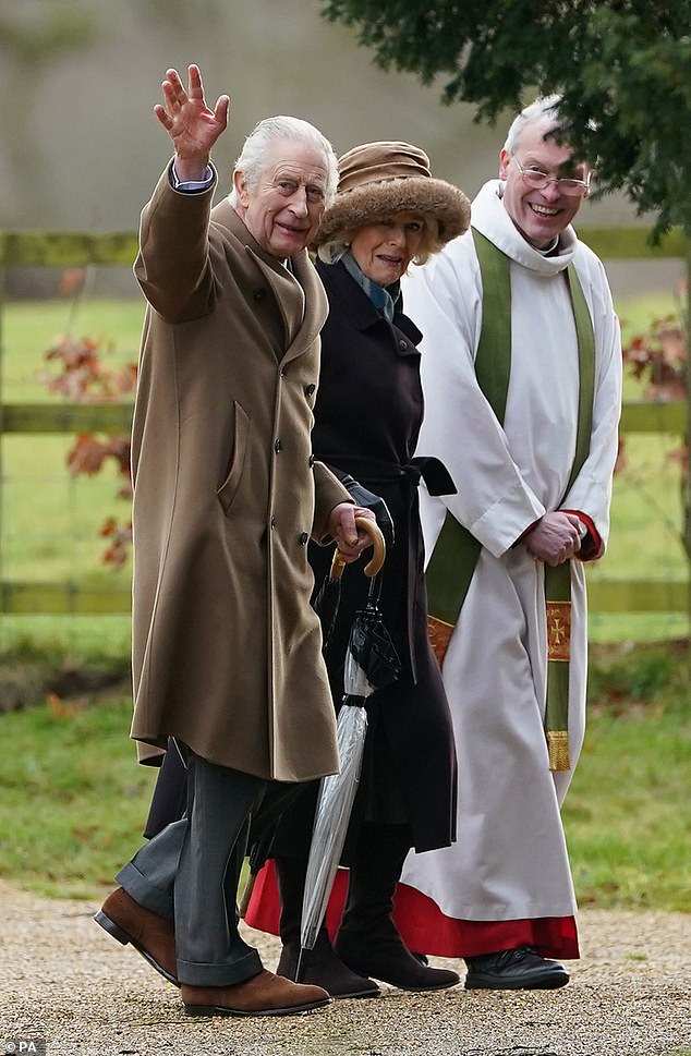 The monarch, 74, greeted supporters as he walked around the Norfolk estate and appeared in good spirits after his stay in hospital.