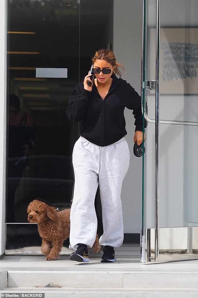 Larsa Pippen was photographed enjoying a walk with her dog in downtown Los Angeles on Sunday.