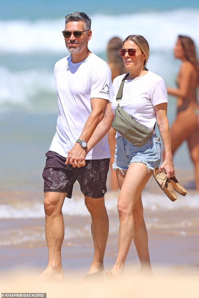 LeAnn Rimes and her husband Eddie Cibrian put on a display of love on Thursday while heading out for a stroll along Sydney's Bondi Beach.  Both in the photo