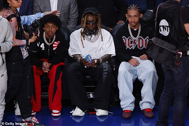 Lil Wayne was seen at the All-Star Game on Sunday night in Indianapolis with his kids.