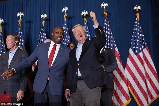 Senator Lindsey Graham (right) and Senator Tim Scott (right) after Trump won the primary in their state.  Graham was booed by the rowdy crowd at Trump's victory speech when the former president mentioned he was there.