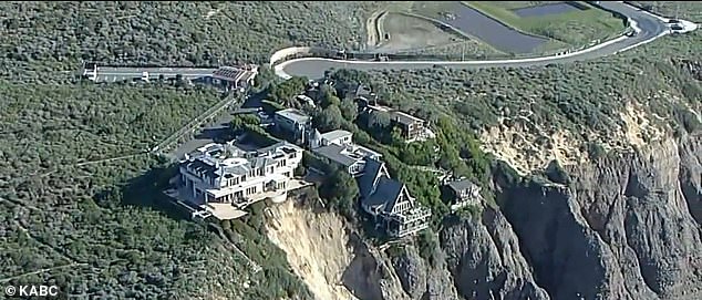 The collapse occurred on Scenic Drive in Dana Point on Friday and sent mud and debris sliding into the 150-foot chasm below. As of Sunday, no evacuations had been ordered and engineers were assessing the structural integrity of the houses, the only three on the cliff.