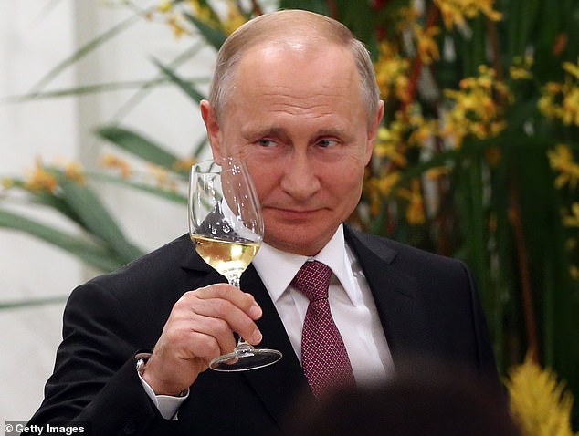 Vladimir Putin (pictured) has been accused of approving his assassination