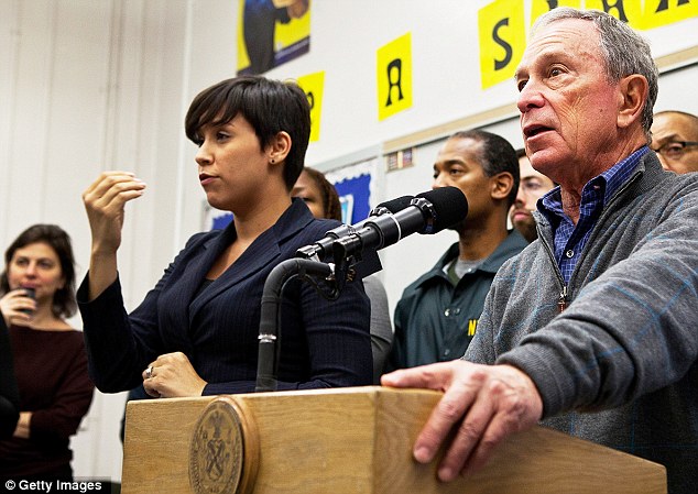 Quietly brilliant: For many, interpreter Lydia Callis (left) has been the best thing about Mayor Michael Bloomberg's Hurricane Sandy briefings.