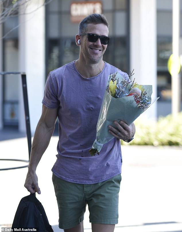 MAFS boyfriend Jono McCullough was pictured looking contrite with apology flowers the morning after failing to support his wife at dinner on Wednesday.