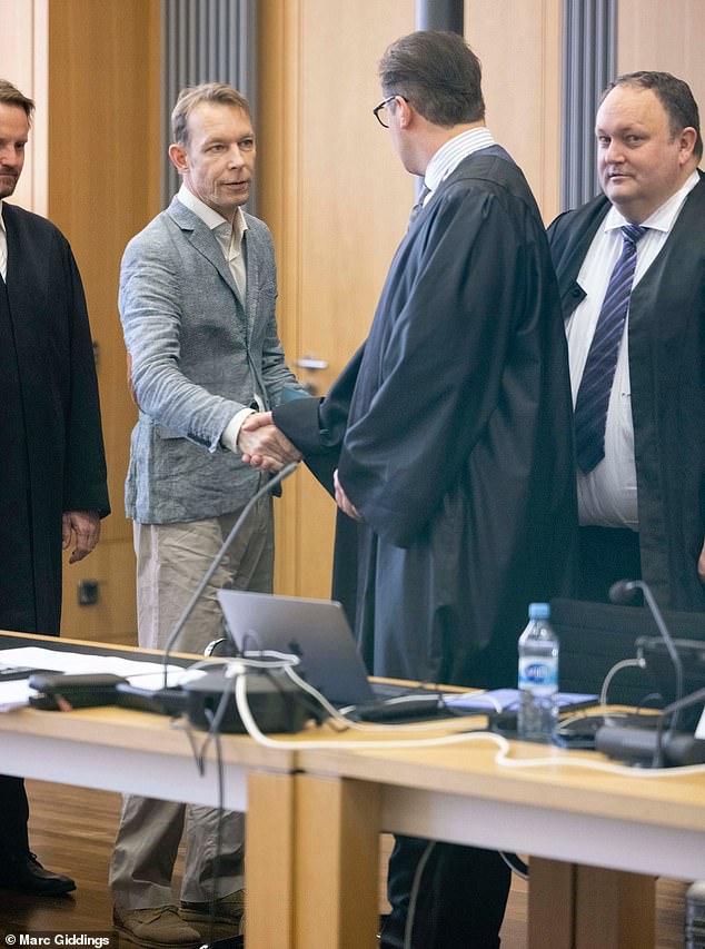 Wearing the same jacket as last week, white shirt and khaki pants, Brueckner (left) shook hands with the entire legal team and winked at his legal team.