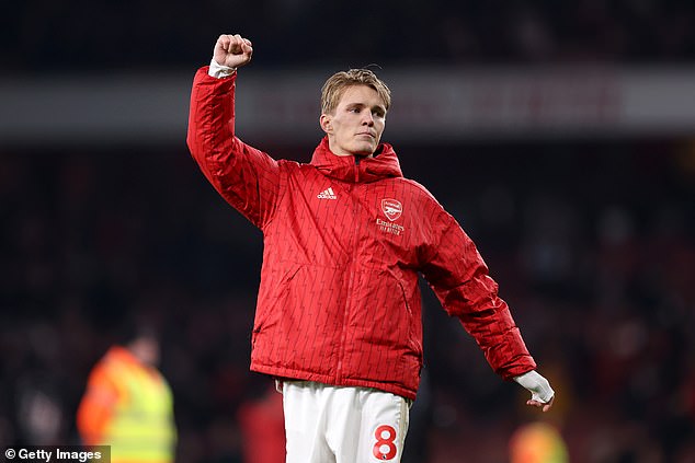 Martin Odegaard celebrates Arsenal's 4-1 victory over Newcastle as he kept pace with Liverpool and Manchester City in the race for the Premier League title.