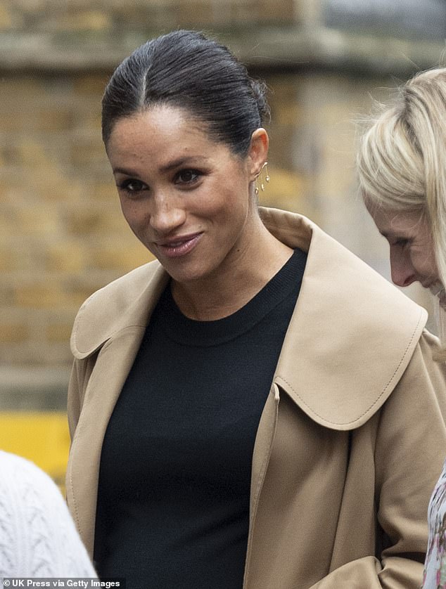 Pictured: Meghan Markle is seen wearing the pair of £1,990 diamond earrings to visit the Smart Works headquarters in January 2019.