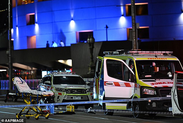 Police justified shooting a man on Melbourne's Princes Bridge on Friday by saying he posed a threat to officers (pictured, scene of incident with emergency crews)