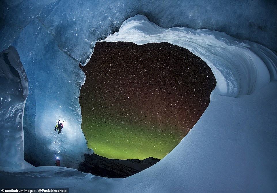 Paul Zizka, 44, from Banff, Canada, specializes in photographing auroras in some of the region's most scenic parks.