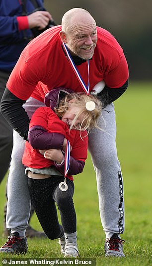 All smiles: beaming Lena seemed to be enjoying the outing with her dad in Gloucester