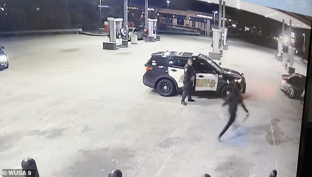 Two other suspected thieves fly across the parking lot and break into the car without the officer noticing.